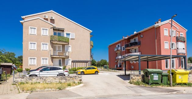 Charming White Apartment with Balcony and Parking