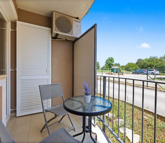 Charming White Apartment with Balcony and Parking